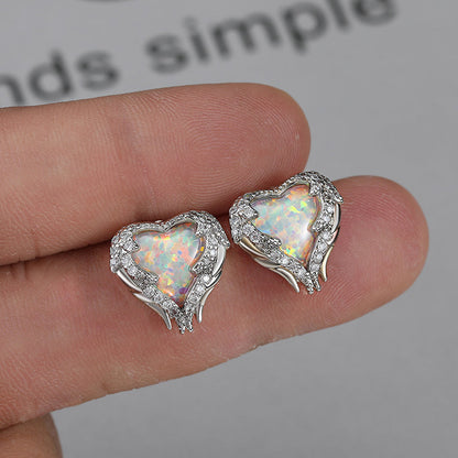 Oorbel en ketting in hartvorm