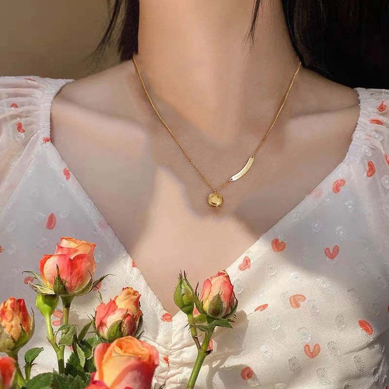 Nousa | Geometrische smiley ketting