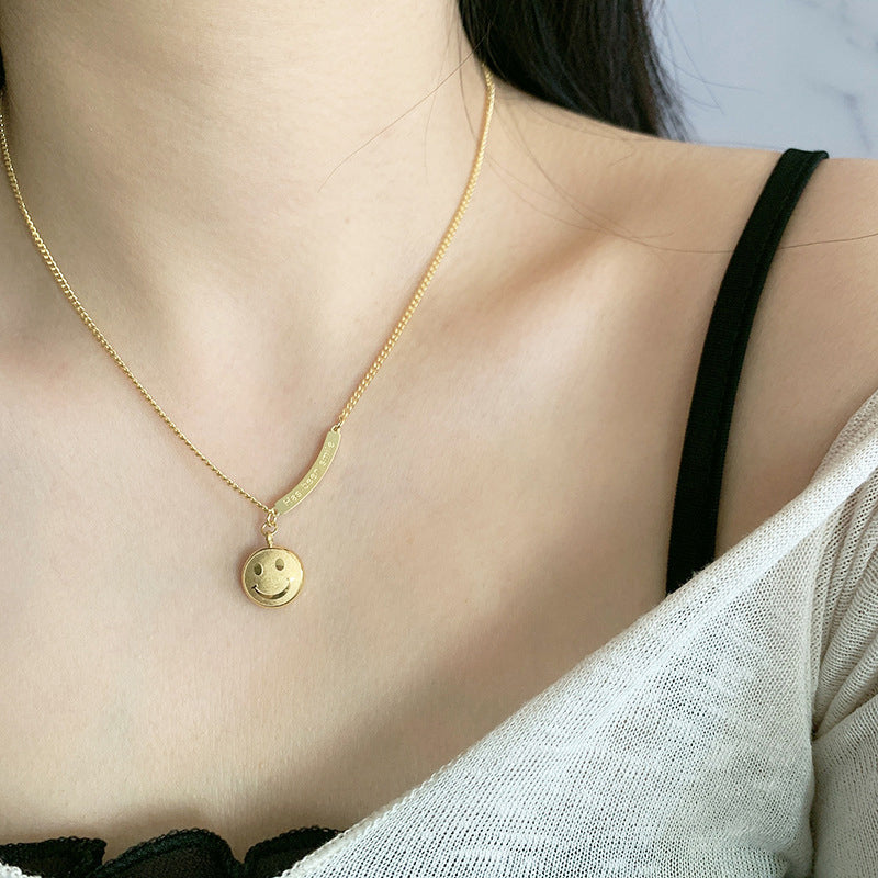 Nousa | Geometrische smiley ketting